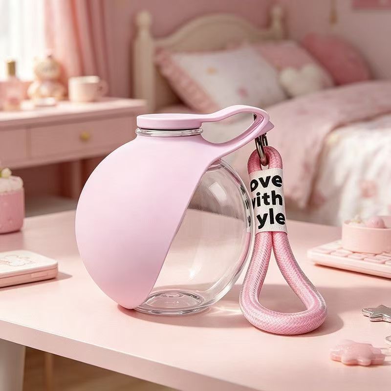 Portable pet water bottle, hanging spherical foldable water fountain for outdoor dogs.