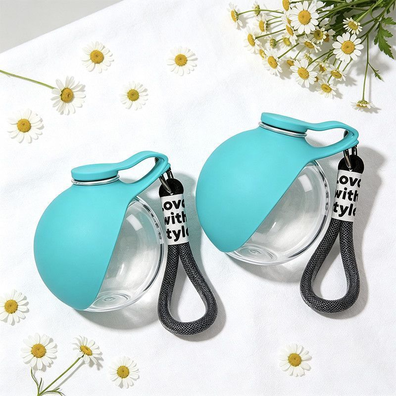 Portable pet water bottle, hanging spherical foldable water fountain for outdoor dogs.